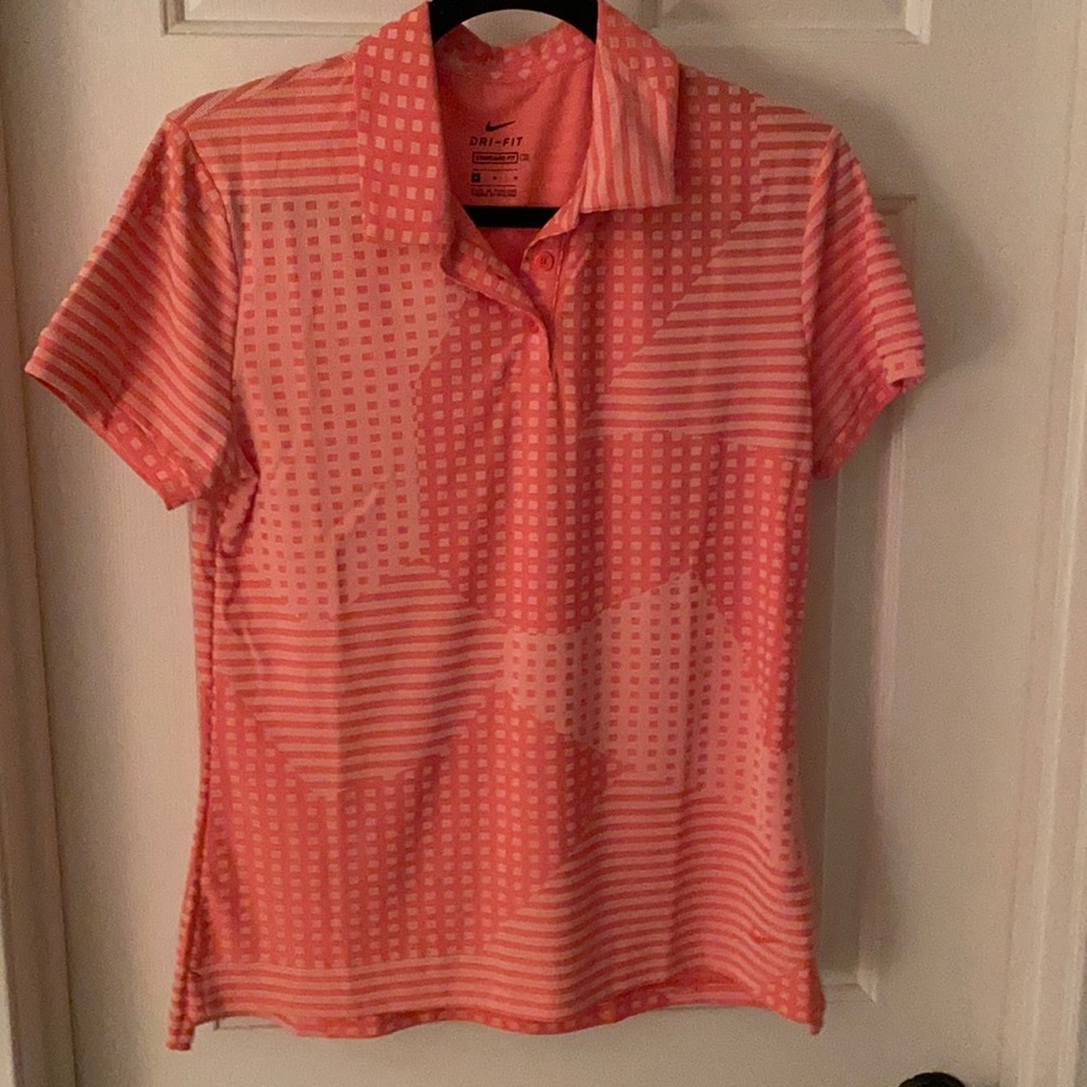Nike golf shirt.